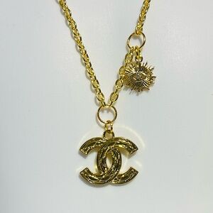 Chanel Gold Sunburst Pendant Necklace